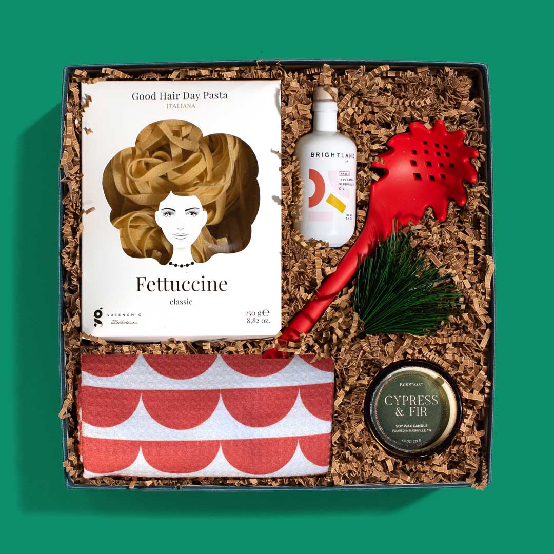 Food-themed holiday gift box with handmade pasta, gourmet olive oil, a pasta spoon and more